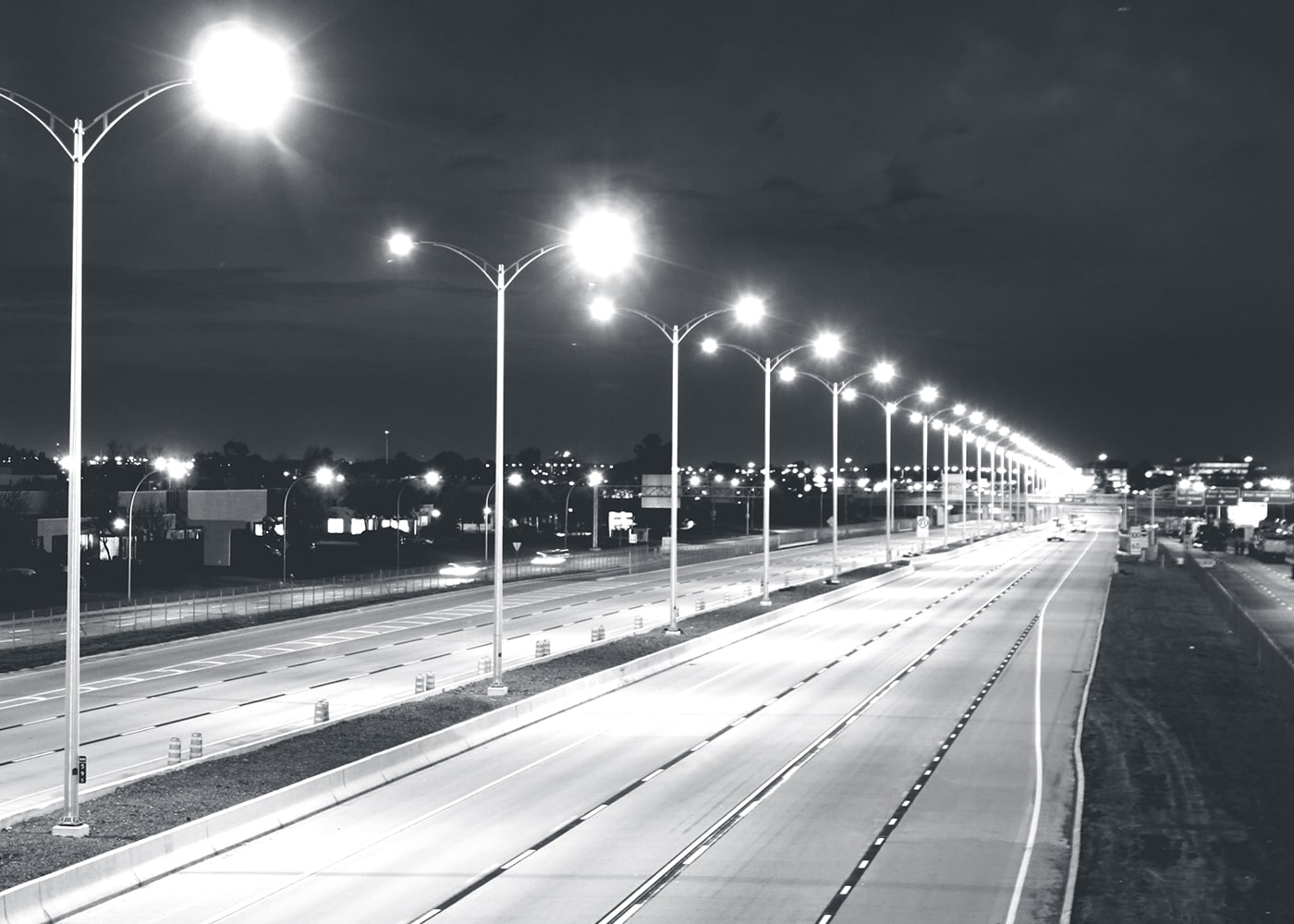 Interstate highway with street lights on