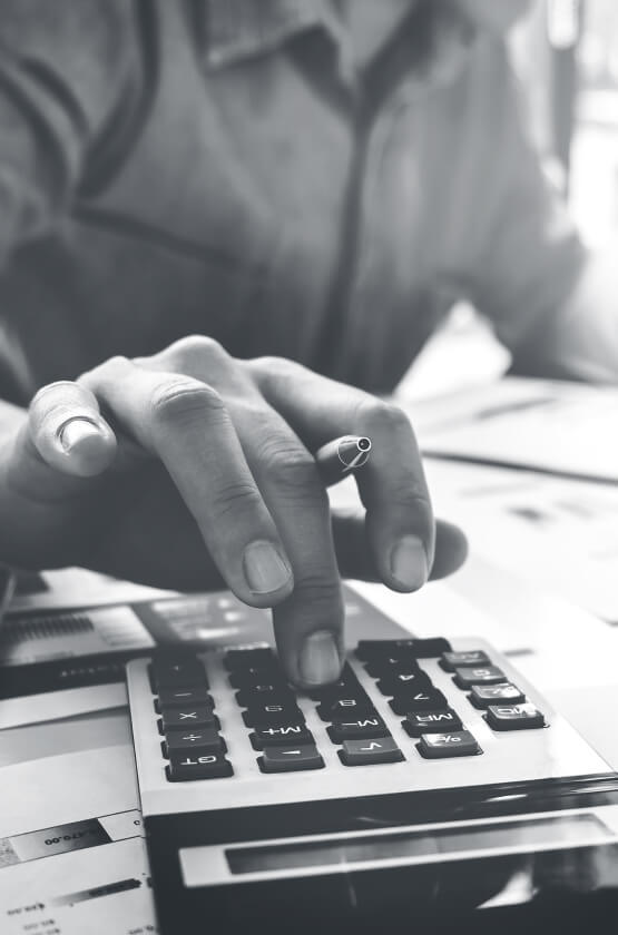 Hand using a calculator